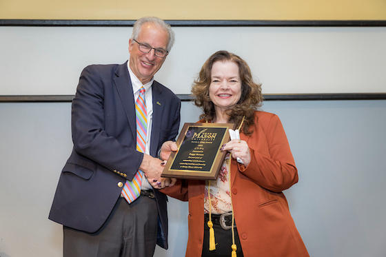 Brouse (on right) with Provost Mark Ginsburg accepting the David J. King Award.